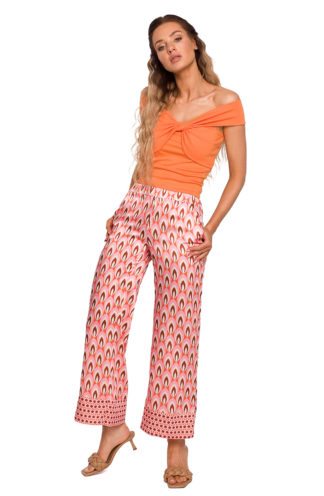 Zwiewne spodnie we wzory pomarańczowe