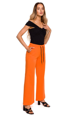 Szerokie spodnie dresowe pomarańczowe
